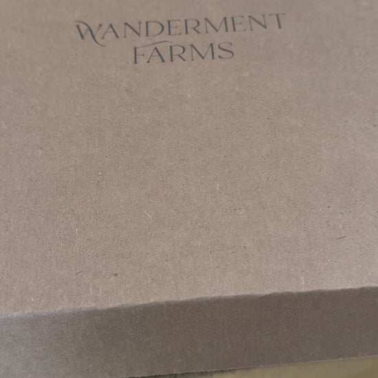 Wanderment Farms Curated box of organic produce, eggs, and sourdough bread