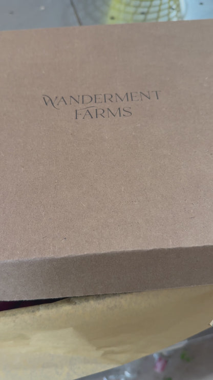 Wanderment Farms Curated box of organic produce, eggs, and sourdough bread